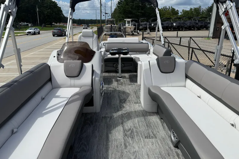 Slide: The Image of 2022 Avalon Catalina VRL 25' pontoon boat interior with luxurious seating and modern design. - 14