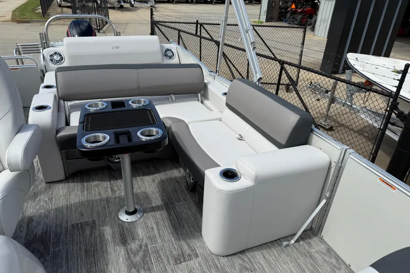Slide: The Image of 2022 Avalon Catalina VRL 25' boat interior with seating and table, showcasing modern design. - 16