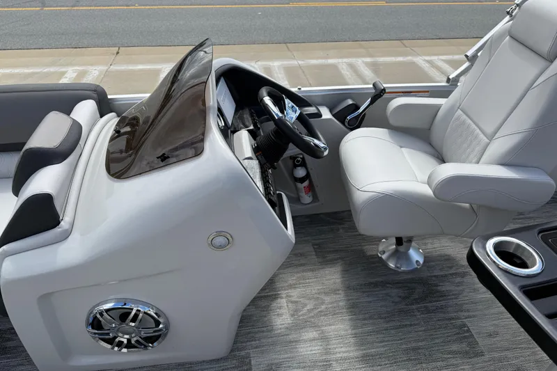 Slide: The Image of Interior of 2022 Avalon Catalina VRL boat with sleek helm and comfortable seating. - 21