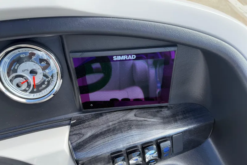 Slide: The Image of Dashboard of 2022 Avalon Catalina VRL boat with Simrad display and speedometer. - 24
