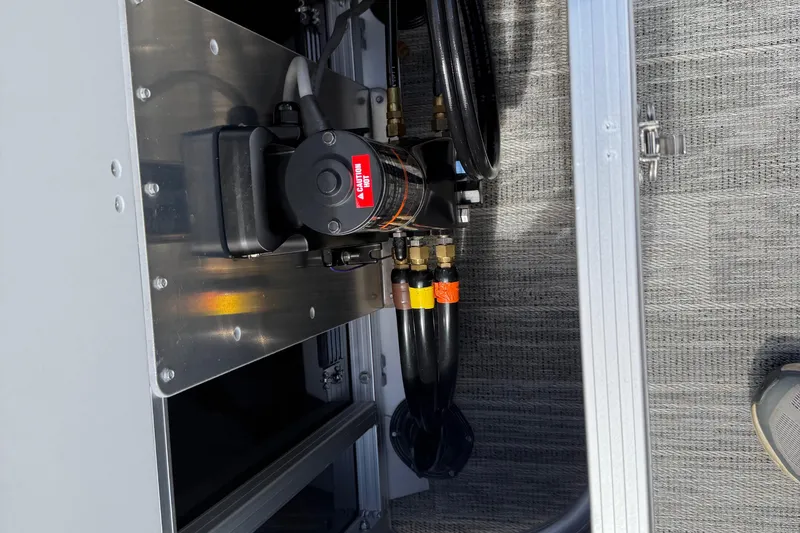 Slide: The Image of 2022 Avalon Catalina VRL 25' boat engine compartment with hydraulic components. - 29