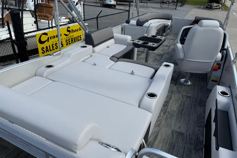 Slide: The Image of 2022 Avalon Catalina VRL 25' pontoon boat interior with luxurious seating and cup holders. - 31