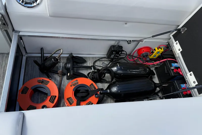 Slide: The Image of Storage compartment of 2022 Avalon Catalina VRL - 25' with boating equipment and accessories. - 34