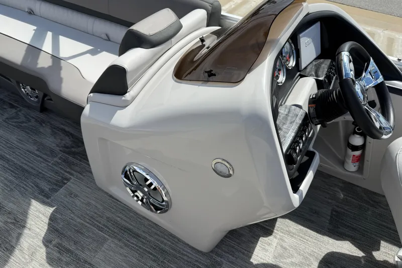 Slide: The Image of 2022 Avalon Catalina VRL 25' boat interior with modern dashboard and seating. - 43