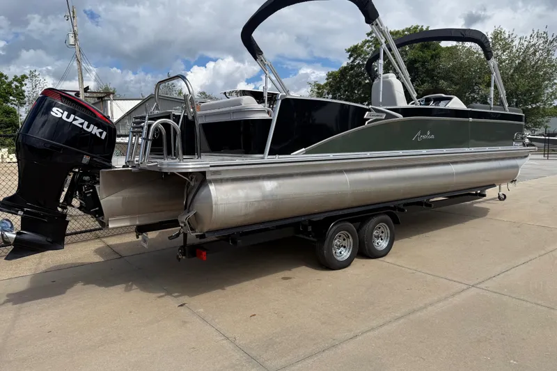 Slide: The Image of 2022 Avalon Catalina VRL 25' pontoon boat with Suzuki outboard motor on trailer. - 9