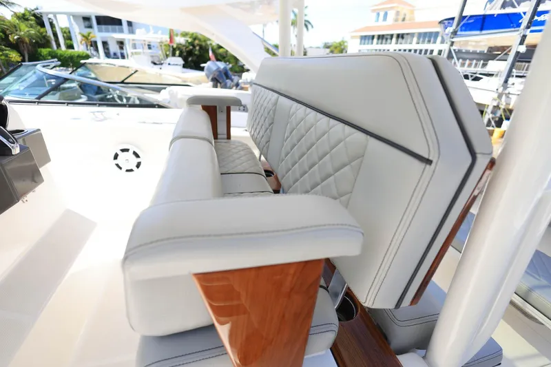 Slide: The Image of Luxurious seating on 2022 Pursuit S 288 Sport boat, featuring elegant design and premium materials. - 16