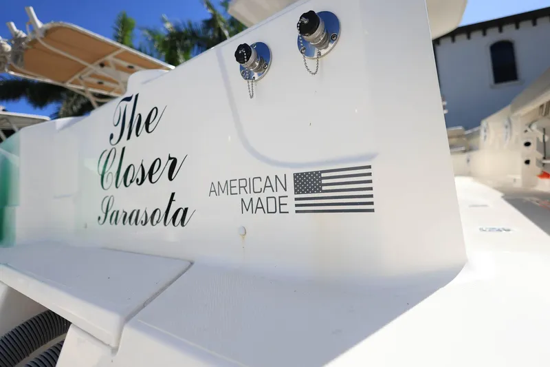 Slide: The Image of 2022 Pursuit S 288 Sport boat with "The Closer Sarasota" and "American Made" text. - 41