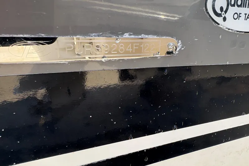 Slide: The Image of 2022 Pursuit S 288 Sport boat identification plate with serial number. - 47