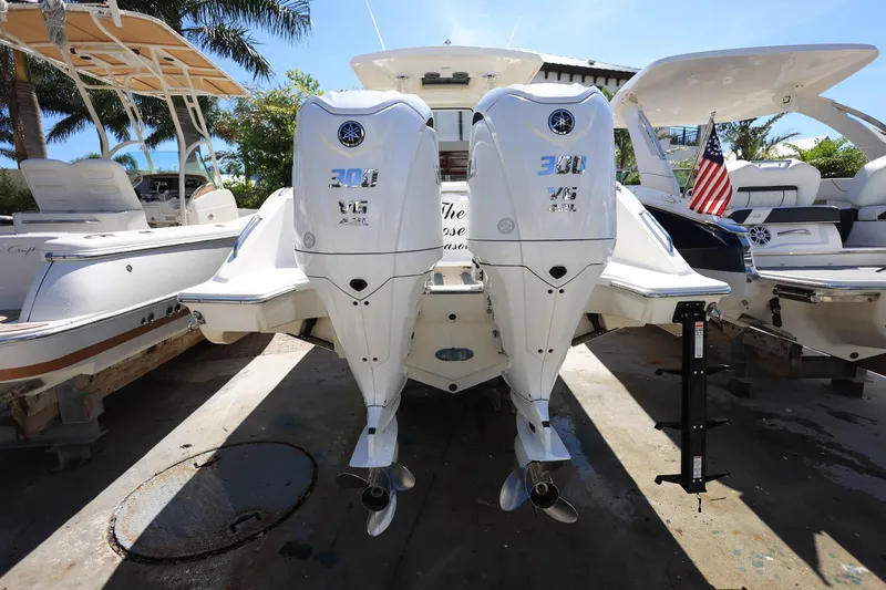 Slide: The Image of 2022 Pursuit S 288 Sport boat with twin Yamaha 300 V6 outboard engines. - 7