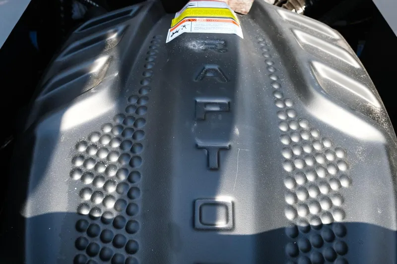 Slide: The Image of 2023 Moomba Mondo engine cover with "Raptor" embossed design. - 10