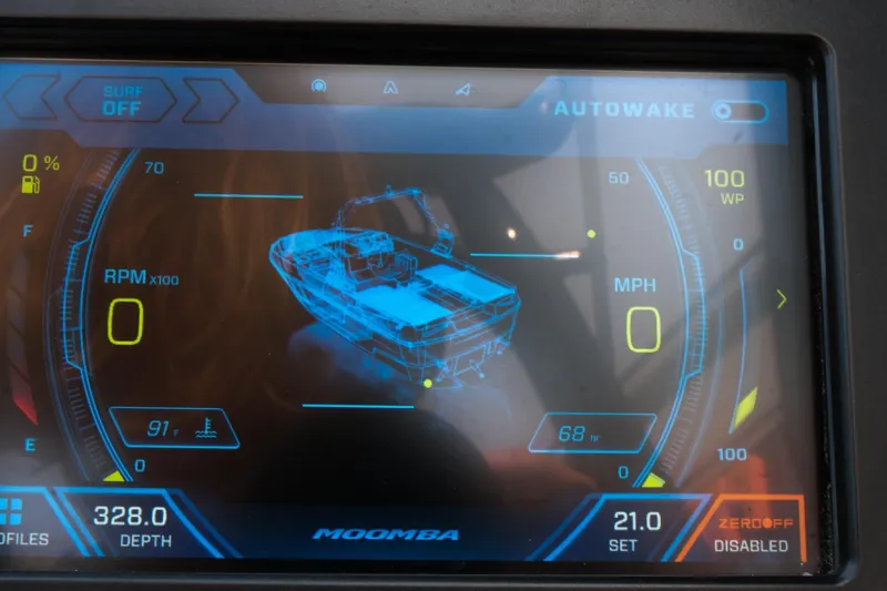 Slide: The Image of 2023 Moomba Mondo dashboard display showing RPM, speed, and depth metrics. - 15