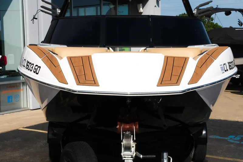 Slide: The Image of 2023 Moomba Mondo boat front view with sleek design and modern features. - 6