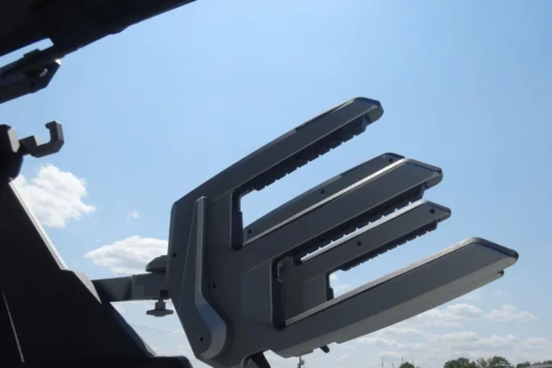 Slide: The Image of Close-up of 2026 Malibu 23 MXZ boat accessory against a clear blue sky. - 15