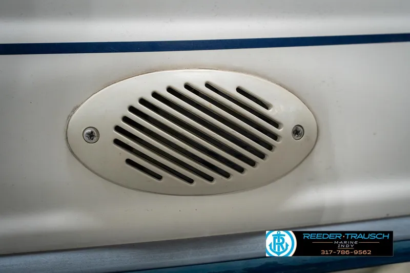 Slide: The Image of Interior of 1995 Sea Ray 175 Bow Rider boat in showroom setting. - 37