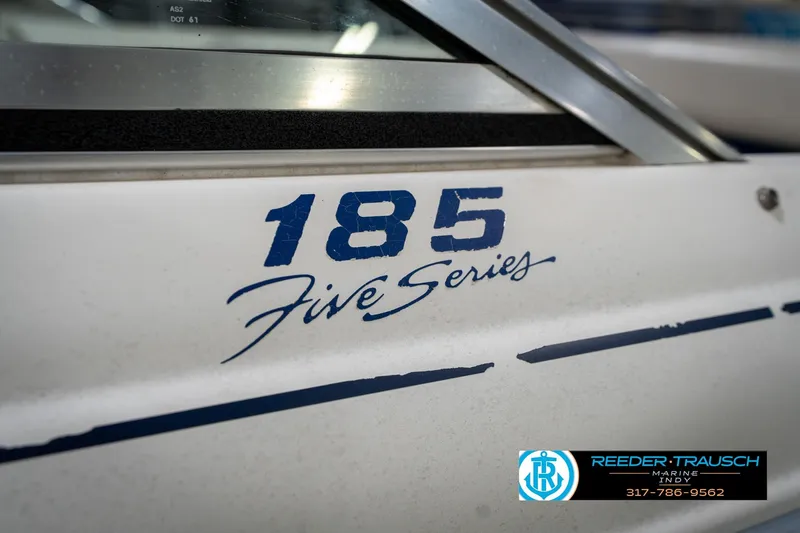 Slide: The Image of 1995 Sea Ray 175 Bow Rider blue carpet interior detail. - 40