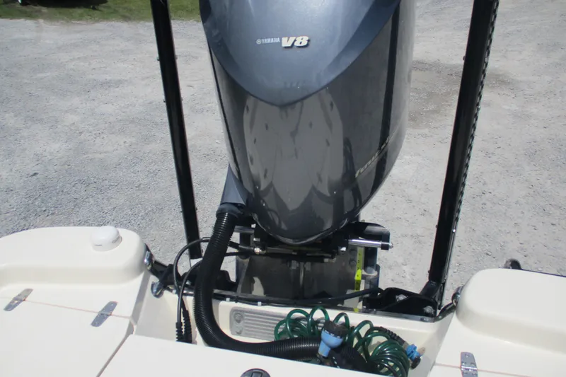 Slide: The Image of 2016 BlackJack 256 Bay boat with Yamaha V8 engine, rear view. - 25