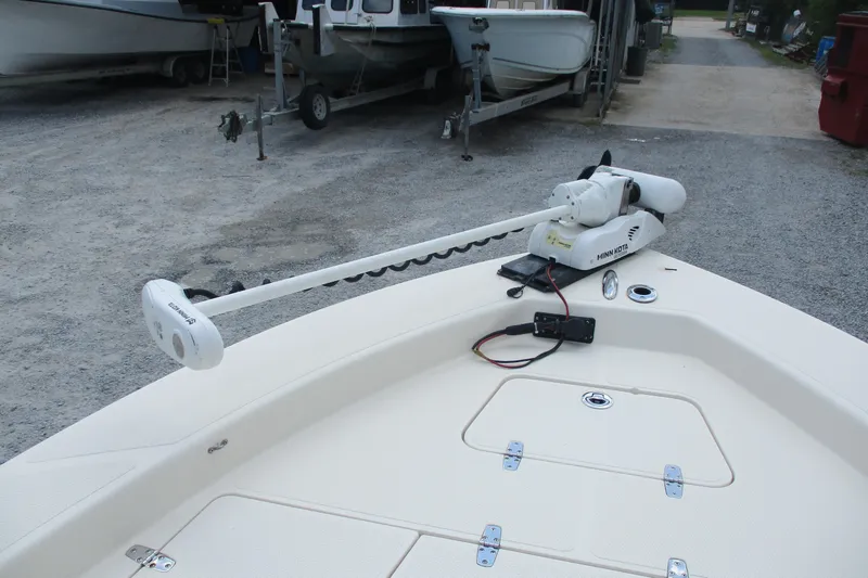 Slide: The Image of 2016 BlackJack 256 Bay boat with Minn Kota trolling motor on deck. - 8