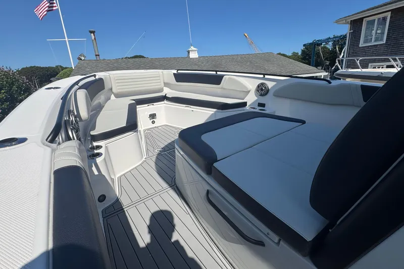 Slide: The Image of 2025 Edgewater 340CC boat interior with control panel, toilet, and mirror. - 30