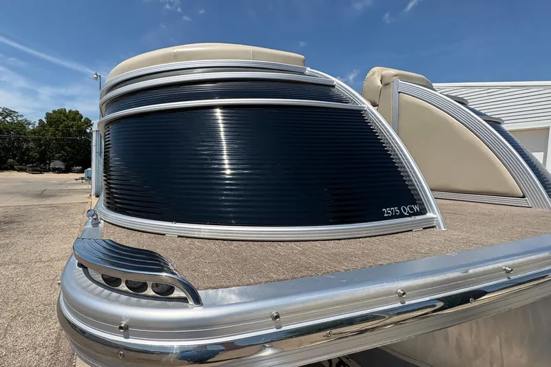 Slide: The Image of 2012 Bennington 2575 QCW I/O pontoon boat with sleek design and modern features. - 31