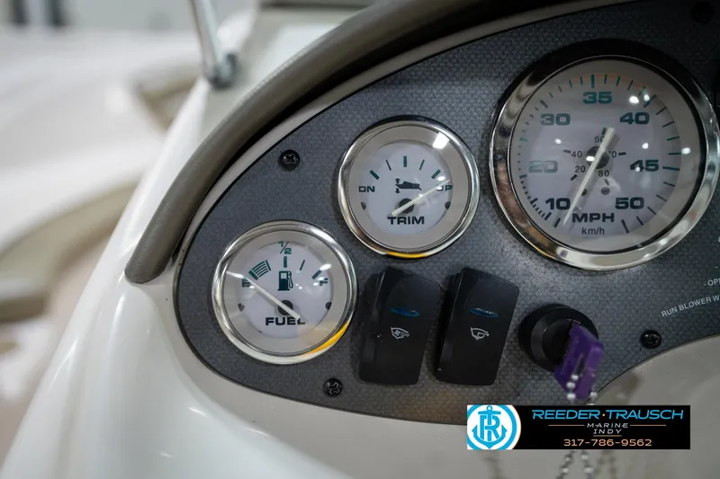 Slide: The Image of Close-up of 2005 Sea Ray 180 Sport steering wheel with logo. - 29
