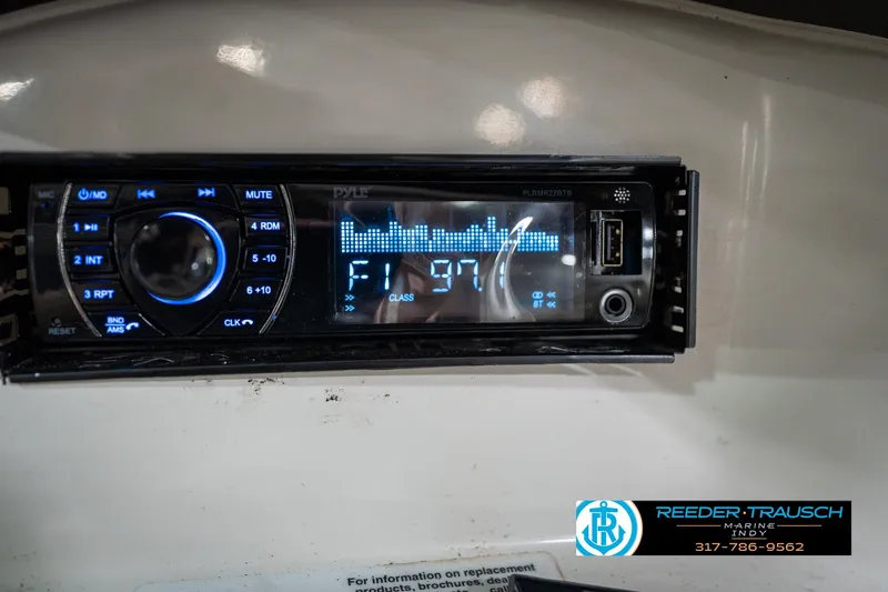 Slide: The Image of Dashboard of a 2005 Sea Ray 180 Sport boat with depth gauge and speedometer. - 31
