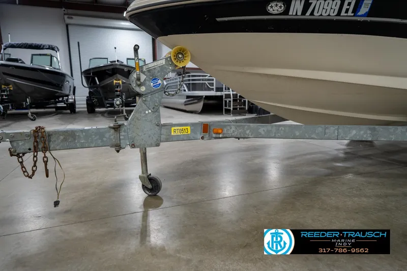 Slide: The Image of Interior view of 2005 Sea Ray 180 Sport boat with carpeted flooring. - 41