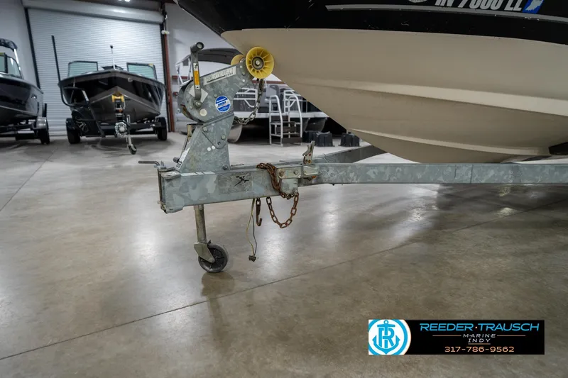 Slide: The Image of 2005 Sea Ray 180 Sport boat propeller and stern drive in a showroom. - 42