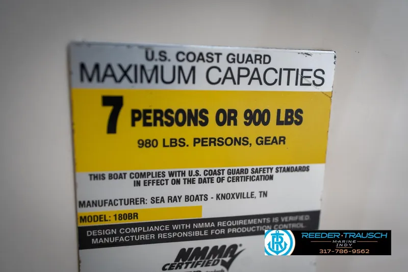 Slide: The Image of Close-up of a 2005 Sea Ray 180 Sport boat cleat, shiny metal finish. - 50