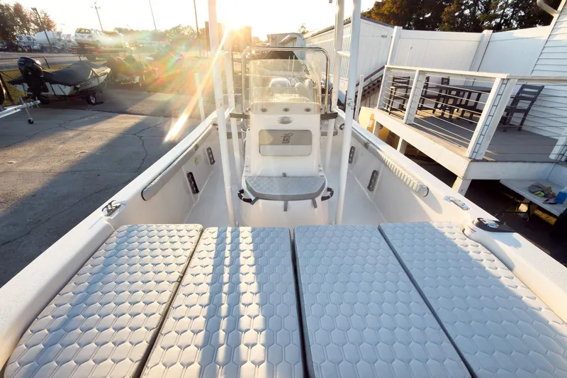 Slide: The Image of 2026 Carolina Skiff 19 LS boat interior with sunlight and modern design. - 10