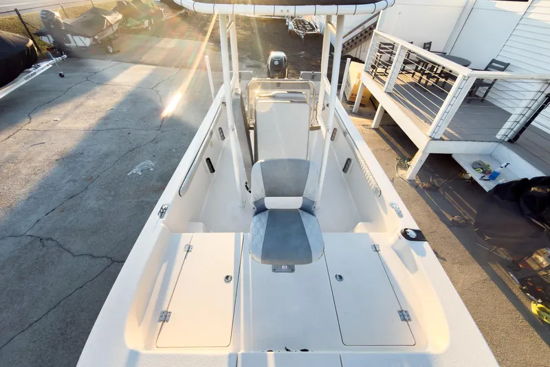 Slide: The Image of 2026 Carolina Skiff 19 LS boat interior with seating and storage compartments. - 28