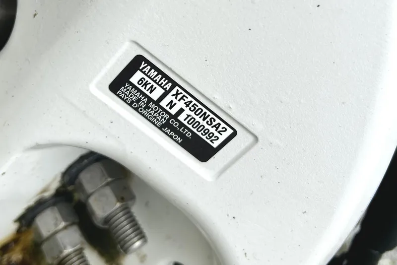 Slide: The Image of Yamaha motor label on 2024 Regal 42 FXO, model XF450NSA2, made in Japan. - 57