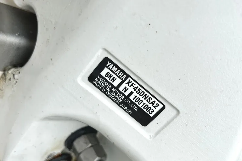 Slide: The Image of Yamaha motor label on 2024 Regal 42 FXO, model XF450NSA2, made in Japan. - 58