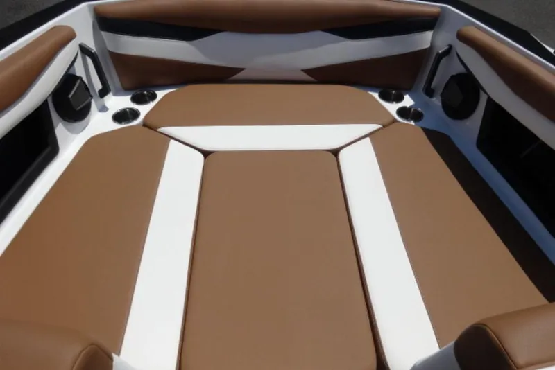 Slide: The Image of 2025 Axis A245 boat interior with brown and white cushioned seating. - 4