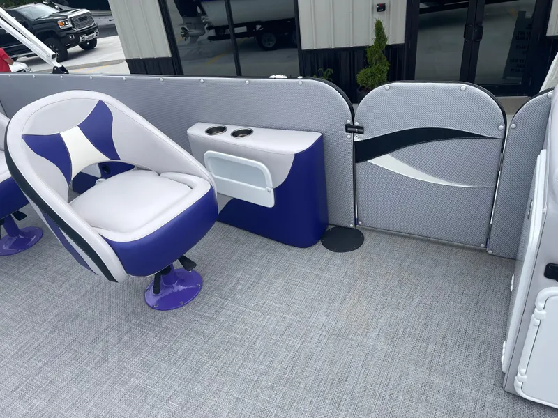 Slide: The Image of 2023 PlayCraft 3000 Infinity Extreme boat interior with stylish seating and modern design. - 22