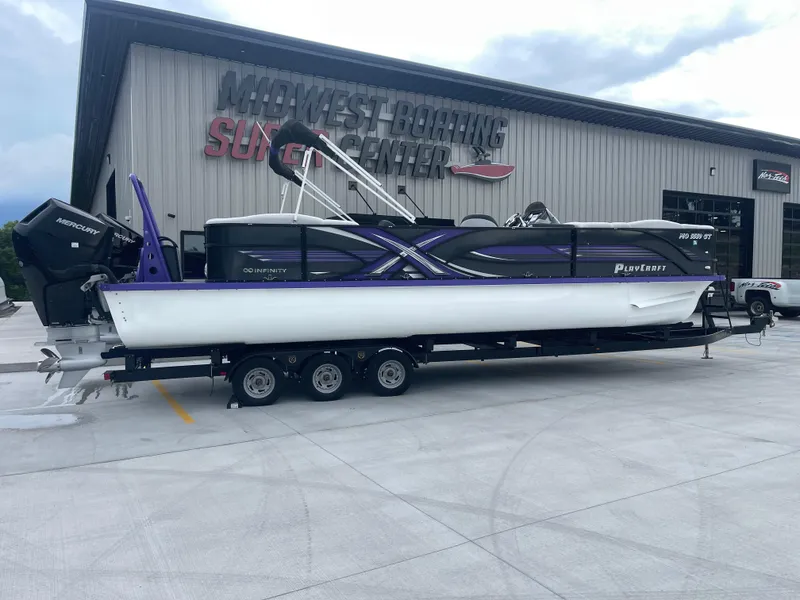 Slide: The Image of 2023 PlayCraft 3000 Infinity Extreme boat on trailer at Midwest Boating Center. - 4