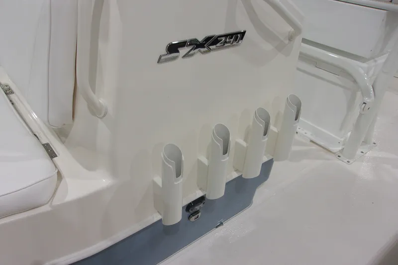 Slide: The Image of 2026 Skeeter 241 boat with rod holders and SX 241 logo. - 12