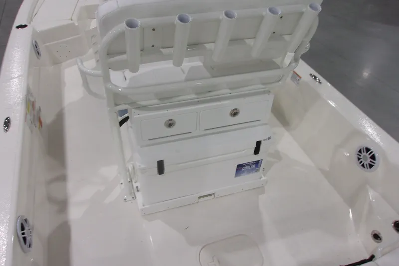 Slide: The Image of 2026 Skeeter 241 boat interior with rod holders and storage compartments. - 16