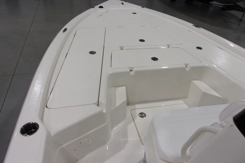 Slide: The Image of 2026 Skeeter 241 boat interior with storage compartments and seating. - 7