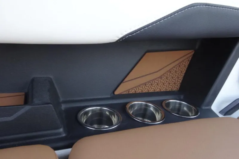 Slide: The Image of 2024 Axis T220 interior with cup holders and stylish panel design. - 5