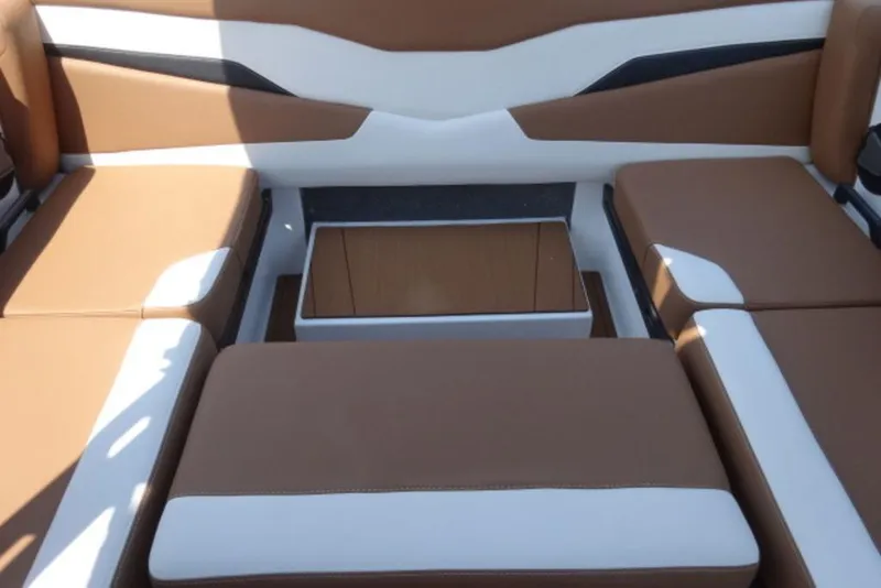 Slide: The Image of 2024 Axis T220 boat interior with brown and white seating arrangement. - 7