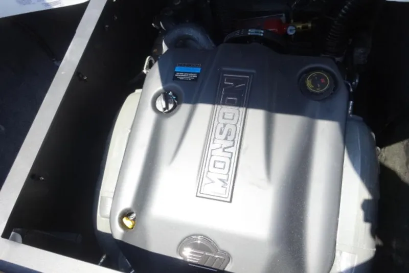 Slide: The Image of 2024 Axis T220 engine compartment featuring a Monsoon engine. - 9