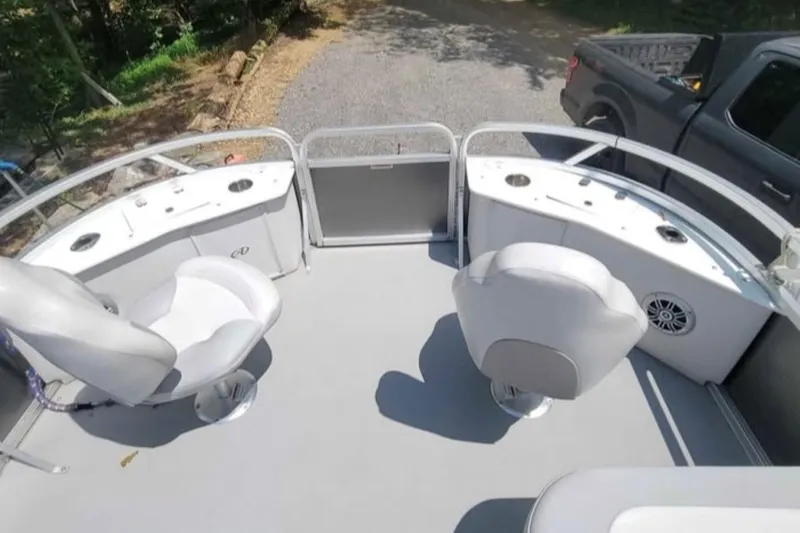 Slide: The Image of 2016 Avalon Catalina LSZ Fish boat interior with seating and control panel. - 8