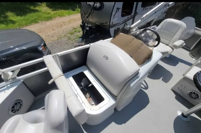 Slide: The Image of 2016 Avalon Catalina LSZ Fish boat interior with seating and storage compartments. - 9