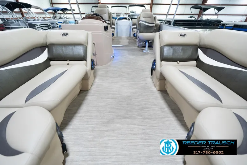 Slide: The Image of Interior of a 2020 Leisurecraft 2435 LX pontoon boat with beige seating. - 15