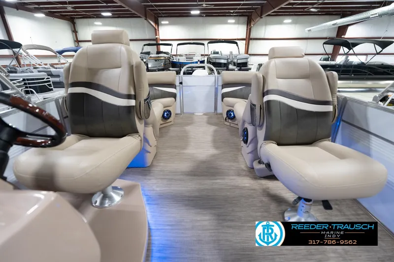 Slide: The Image of Interior of 2020 Leisurecraft 2435 LX boat with luxurious seating and modern design. - 16