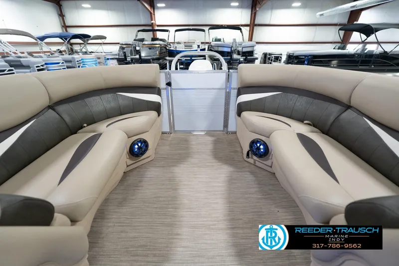 Slide: The Image of Luxurious 2020 Leisurecraft 2435 LX pontoon boat interior with plush seating and modern design. - 17