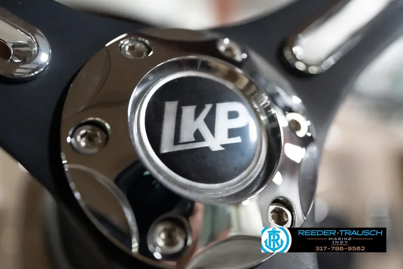 Slide: The Image of Close-up of a 2020 Leisurecraft 2435 LX steering wheel with LKP logo. - 30