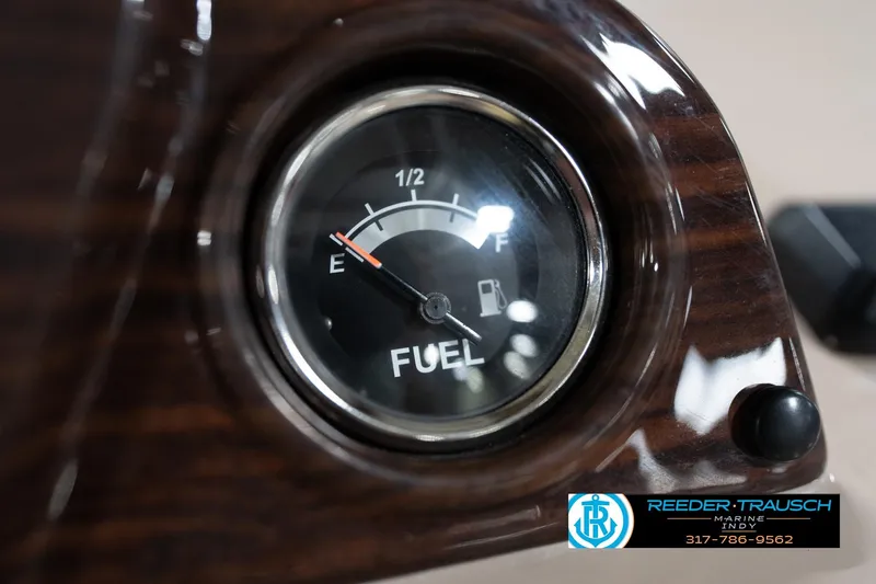 Slide: The Image of Fuel gauge on 2020 Leisurecraft 2435 LX, showing near empty. - 33