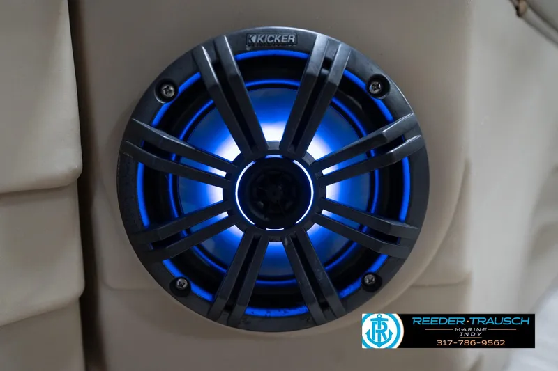 Slide: The Image of Blue LED-lit Kicker speaker on 2020 Leisurecraft 2435 LX boat interior. - 40