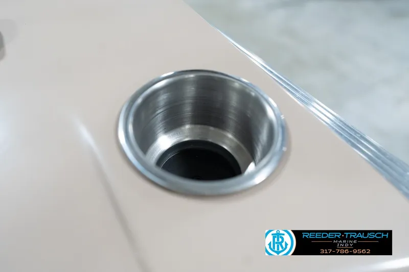 Slide: The Image of Cup holder on Leisurecraft 2435 LX boat, 2020 model, with Reeder-Trausch Marine logo. - 41